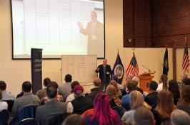 Secretary of Agriculture Tom Vilsack talks to a group of University of New Hampshire students, faculty and staff.